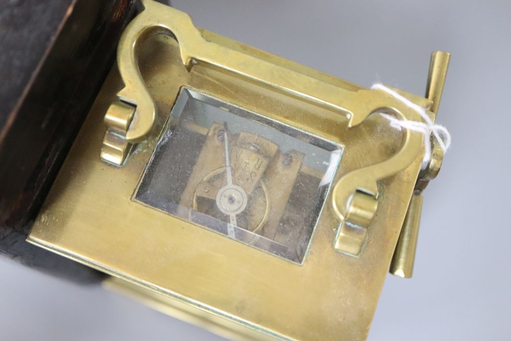 A French brass carriage timepiece with outer carrying case